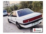 مازدا 323 1997 Image 2