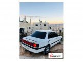 مازدا 323 1997 Image 2