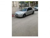 مازدا 323 2004