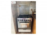 غاز طباخ مع فرن + طاولة مطبخ