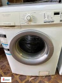 غسالة بحالة ممتازة ⁦⁦7⁩⁩ كيلو
