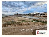 دونم و٥٠ متر محاطة بسور باطون عليها رخصة ڤيلتين Image 1