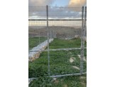ارض راس جبل في سعير محاطة بسور Image 2